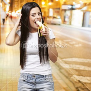 depositphotos_10181674-Woman-eating-a-banana.jpg