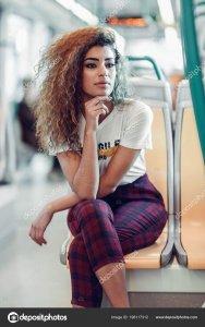 depositphotos_198117312-stock-photo-arabic-woman-sitting-subway-train.jpg