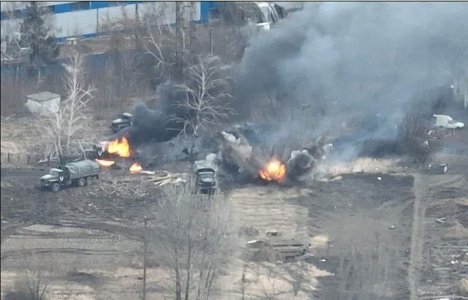 Russian supply convoy hit by artillery fire.jpg