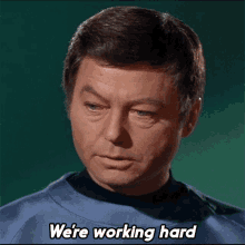 were-working-hard-dr-leonard-mccoy.gif