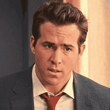 ryan-reynolds-what.gif