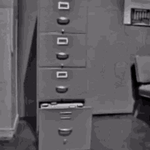 09_13_27_work-files-filing-cabinet.gif