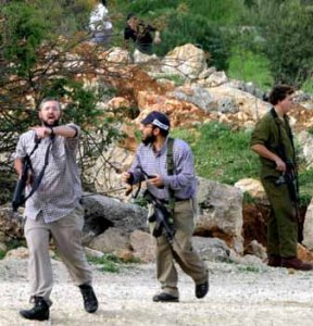 israeli_armed_settlers_attacking_palestinian_civilians_homes_in_hebron__file_2007_2.jpg