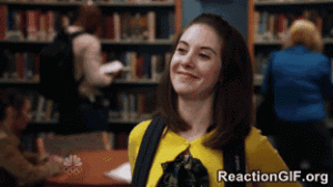 -GIF-Alison-Brie-awkward-embarrassed-flirt-hello-hi-shy-wave-GIF.gif