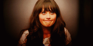 80200-zooey-deschanel-shy-lips-gif-Slru.gif